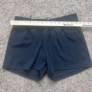 Black Zyia Club shorts.